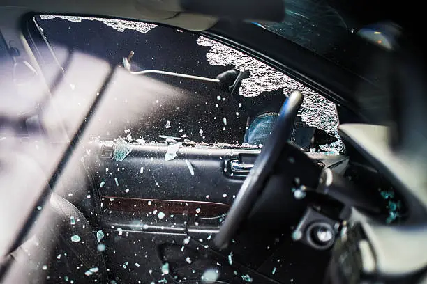 Photo of Car Window Smashed By A Thief