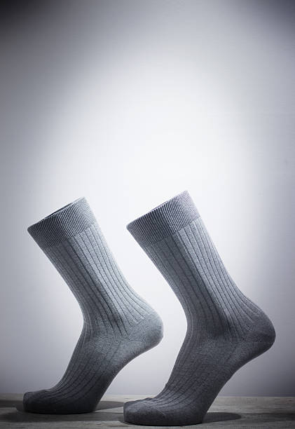 istock Surrealist socks and feet walking without legs 523002959