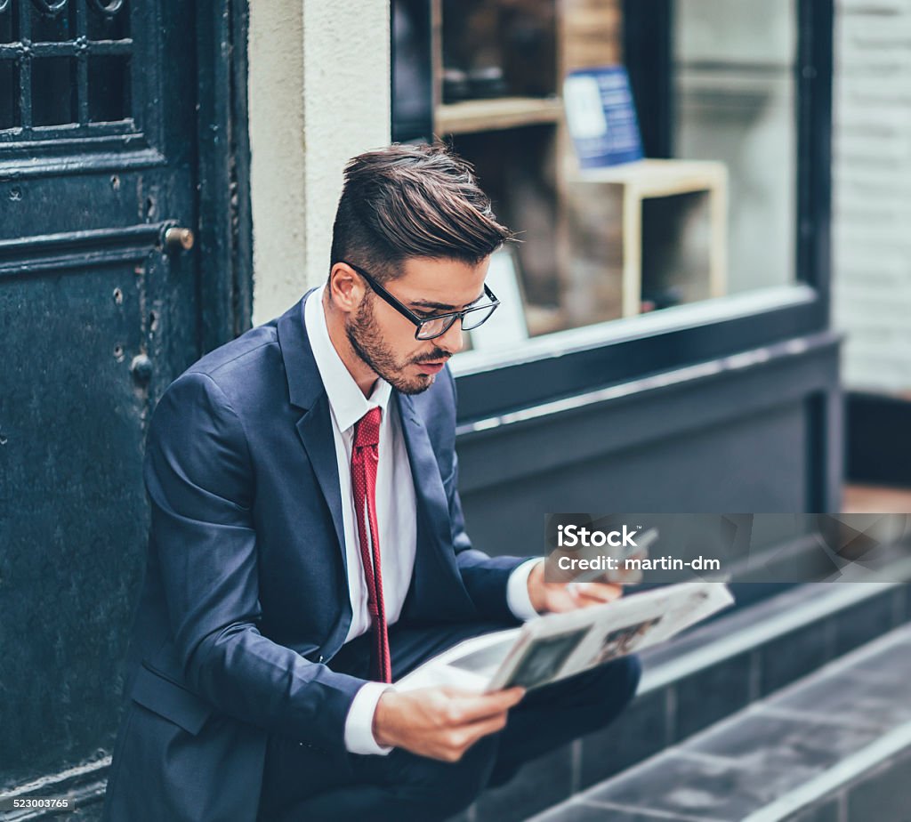 Business people Businessman on the phone Newspaper Stock Photo