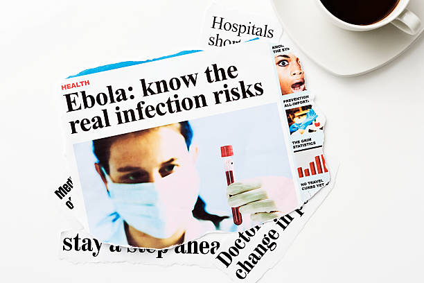 istock Stack of newspaper headlines, all dealing with Ebola 523003859