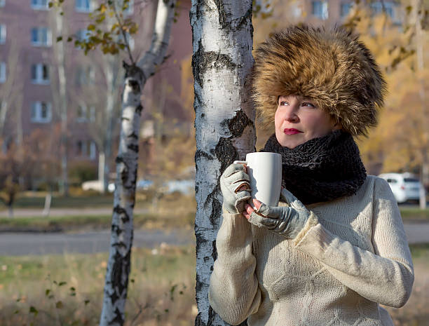 istock Northern beauty leans against birch tree 523005671