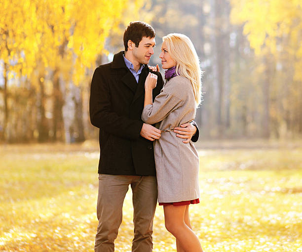 istock Autumn, love, relationships and people concept - lovely young co 523018021