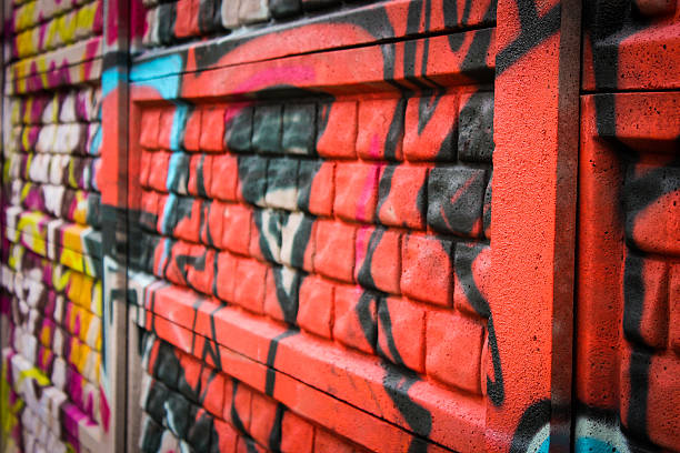 istock Wall with red and yellow graffiti urban scene 523020383