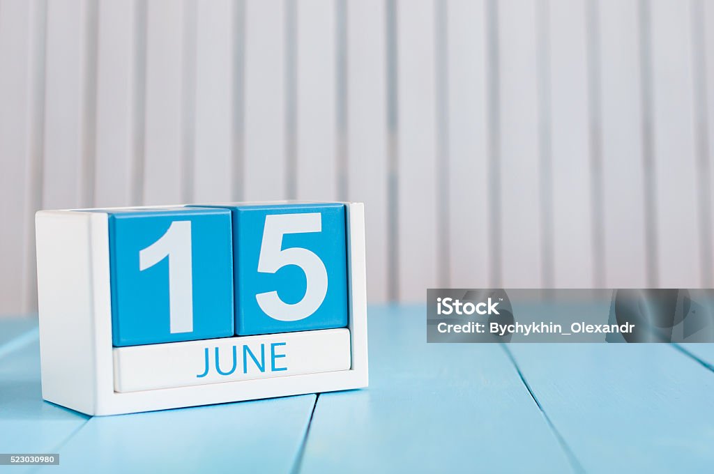 June 15th. Image of june 15 wooden color calendar on June 15th. Image of june 15 wooden color calendar on white background. Summer day. Empty space for text. Global Wind Day. Blank Stock Photo