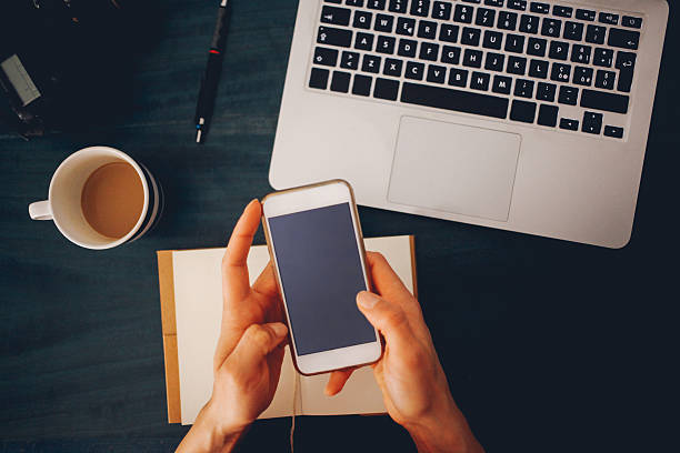 istock Overhead image of a workspace on the desk 523031344