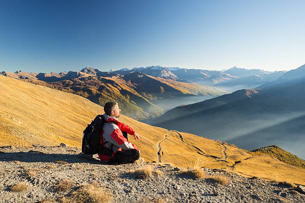 istock Hiker resting on the mountain top 523032137