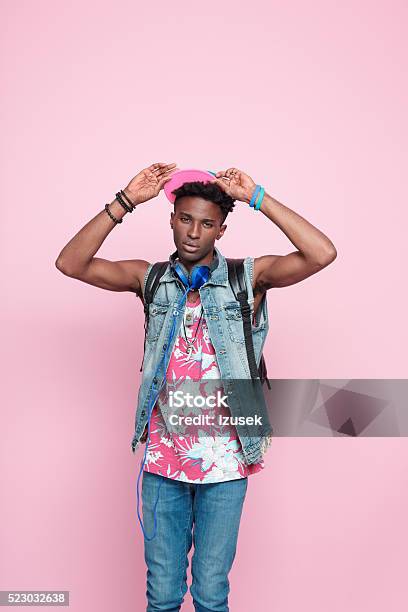 Cool Afro American Guy Summer Studio Portrait Pink Background Stock Photo - Download Image Now