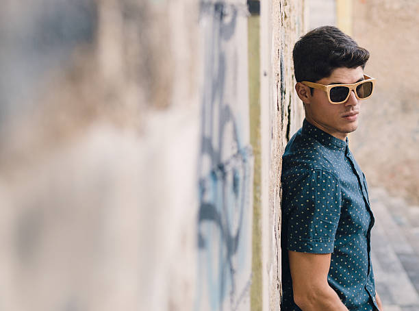istock Fashionable man portrait over ruinous wall 523033001