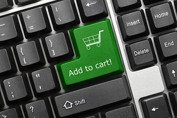 istock Conceptual keyboard - Add to cart (green key) 523033602