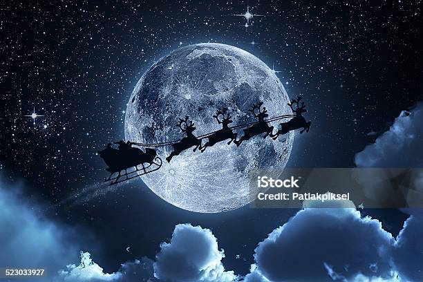 Santa Claus Flying On The Sky Stock Photo - Download Image Now - Santa Claus, Animal Sleigh, Christmas