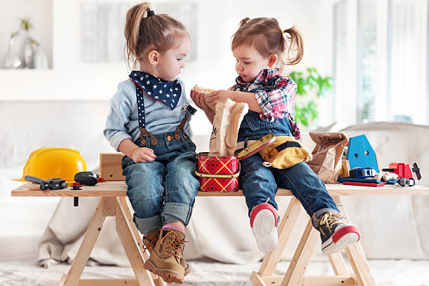 Two Little Girls sharing Lunch