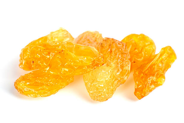 istock Yellow sultanas raisins isolated on white background 523034122