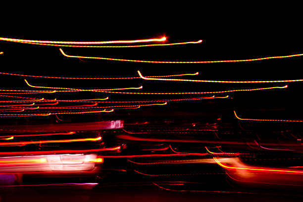 istock Driving at night city light trails 523034767