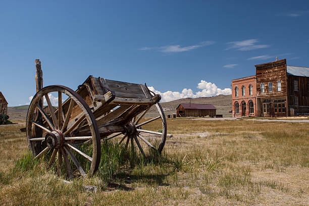 Carriage in Bodie ghost town, California, USA Abandoned carriage in Bodie ghost town, Bodie State Park California, USA horse cart photos stock pictures, royalty-free photos & images