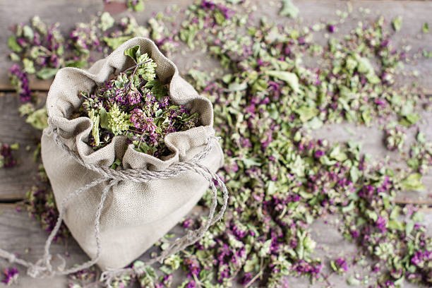 istock Dried oregano in a linen bag and teaspoon on a table 523037052