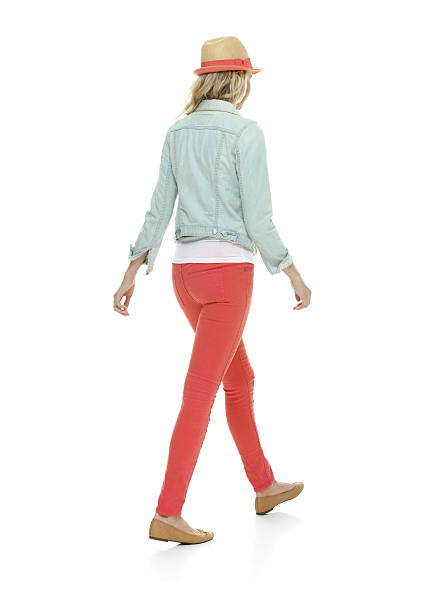 istock Rear view of woman walking 523040552