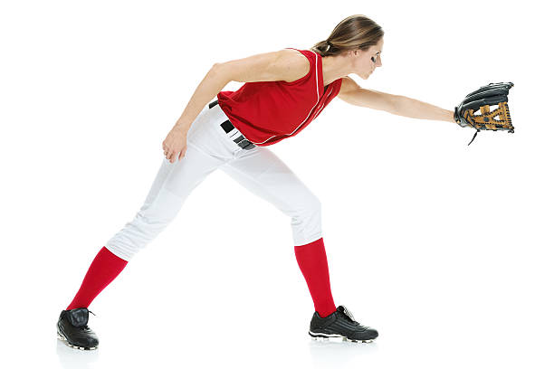 giocatore di softball suona - softball adult catching beautiful foto e immagini stock