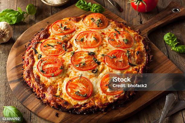 Homemade Vegan Cauliflower Crust Pizza Stock Photo - Download Image Now - Cauliflower, Pastry Dough, Pizza