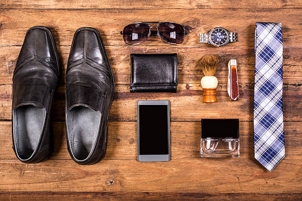 istock Men's accessories organized on table.  No people.  Knolling. 523044854