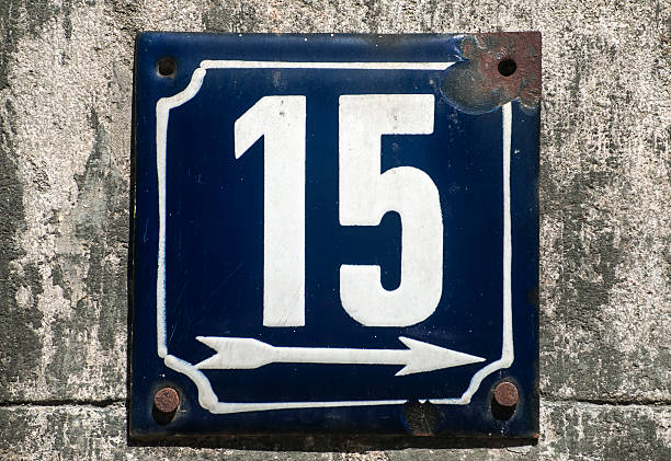 istock Weathered enameled plate number 15 523044900
