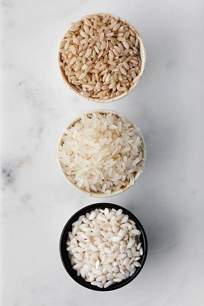 arroz, variedades de arroz - rice food processed grains bowl - fotografias e filmes do acervo