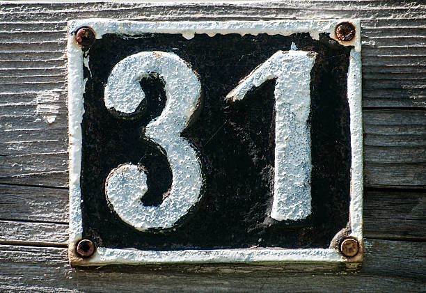 istock Old retro cast iron plate number 31 523047720