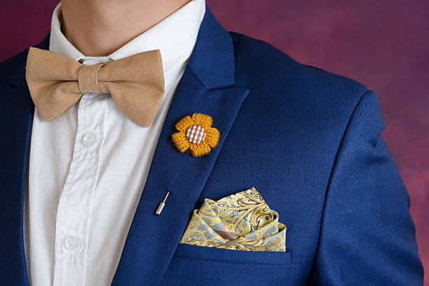 istock man in blue suit bowtie, pocket square 523048472