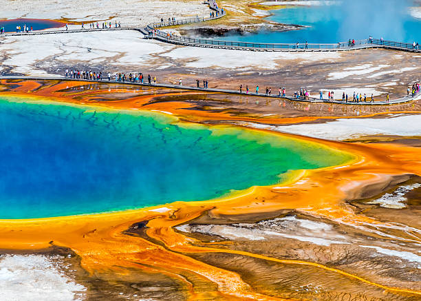 Explosion of colours in Yellowstone The well known national landmark Grand Prismatic in Yellowstone  midway geyser basin photos stock pictures, royalty-free photos & images