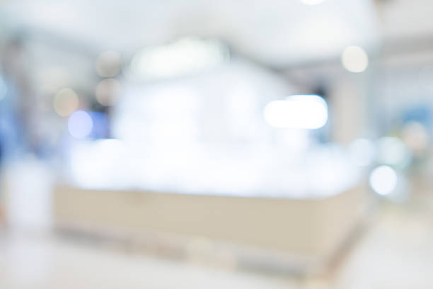 istock Store, shopping mall abstract defocused blurred background 523049886