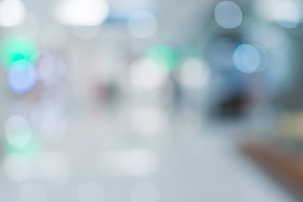 istock Store, shopping mall abstract defocused blurred background 523050606