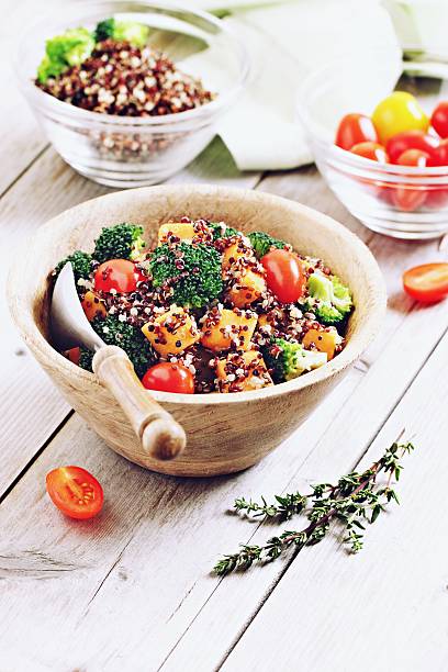 istock Quinoa salad with broccoli,sweet potatoes and tomatoes 523050840