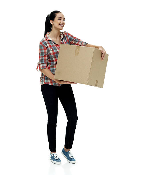 istock Smiling female moving house 523053972