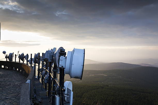 istock Transmitters and aerials on telecommunication tower during sunset 523056196