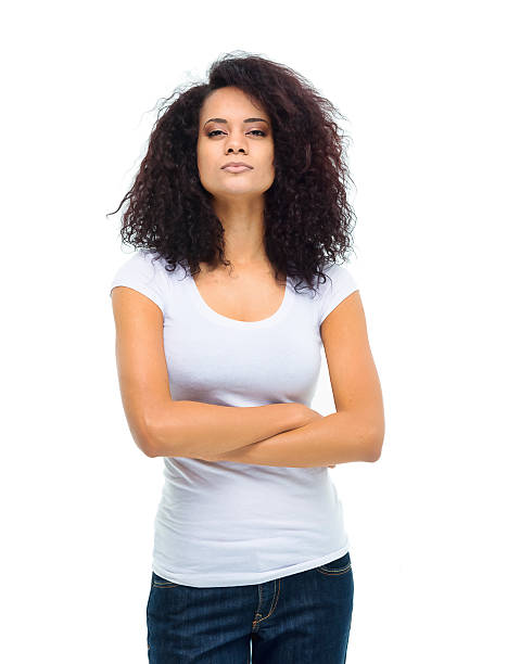 istock Woman standing with arms crossed 523056308