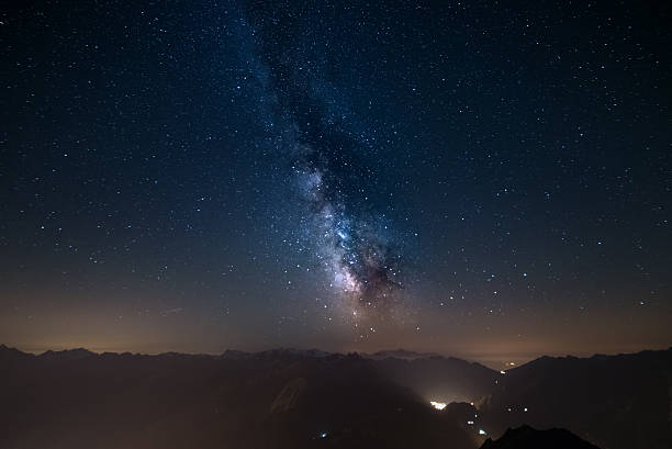 istock Glowing Milky Way and starry sky from the Alps 523056862