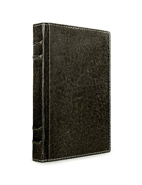 istock Old book cover is isolated on a white background 523057684