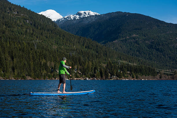 istock Stand up paddle boarding on the lake 523057802