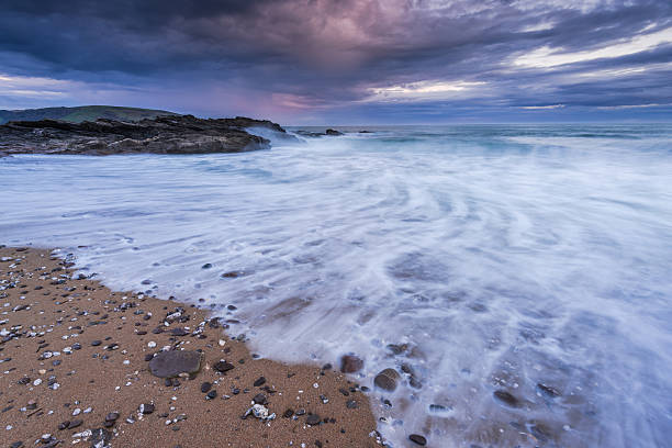 istock Vibrant and saturated long exposure sunset at beach 523057838