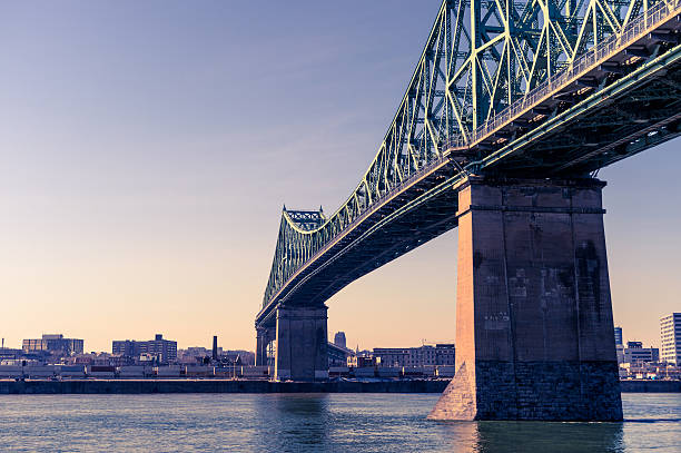 Jacques-Cartier Bridge in Montreal, at sunset Jacques-Cartier Bridge in Montreal, at sunset lawrence kansas stock pictures, royalty-free photos & images