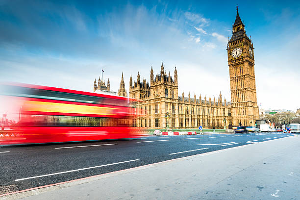 istock Blured iconic bus and Big Ben in London 523060432