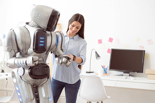 istock Delighted girl touching robot 523061482
