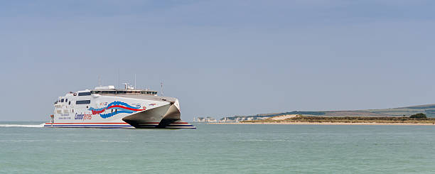 Condor Ferry Poole, England - July 18, 2014: Condor Ferries ferry arrive to Poole at Poole Harbour sandbanks poole harbour stock pictures, royalty-free photos & images