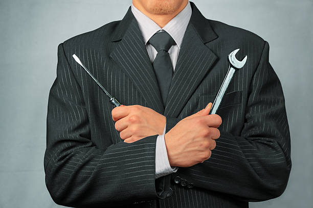 istock Businessman holds tools, concept of business creation 523090983