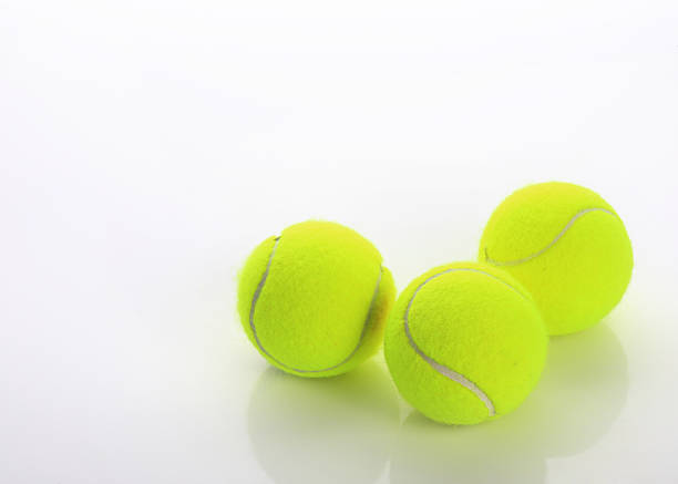 Tennis balls with perspective isolated on white background
