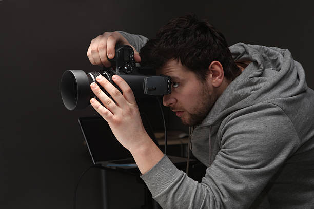 istock Portrait photographer with modern digital camera 523109617