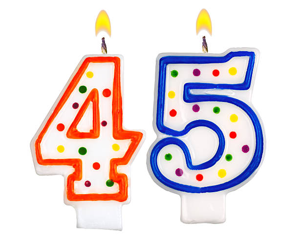 istock Birthday candles number forty five isolated on white background 523112045