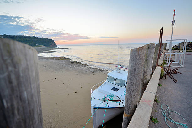 istock Lobster fishing boat at low tide 523112771