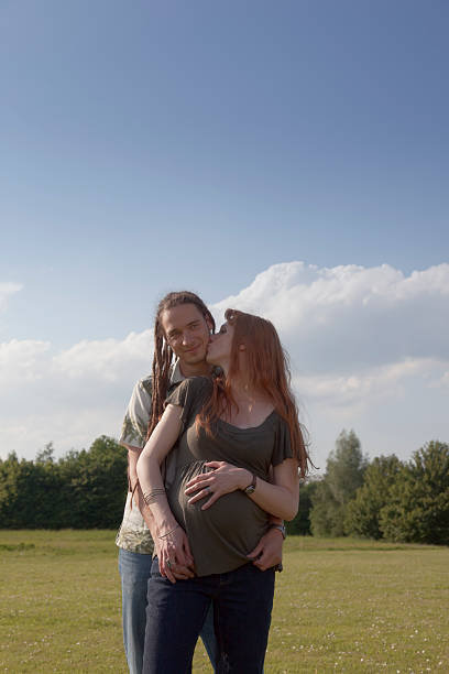 istock Young Couple in a park awaiting a Baby 523113451