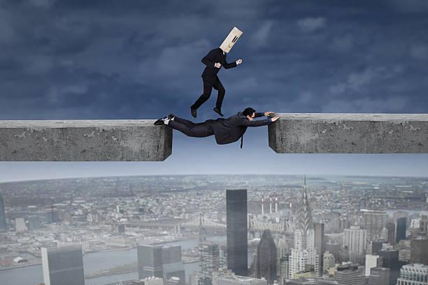 istock Anonymous entrepreneur runs above his partner 523114391