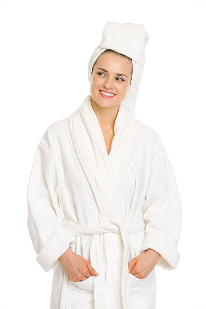 istock young woman in bathrobe looking on copy space 523115185